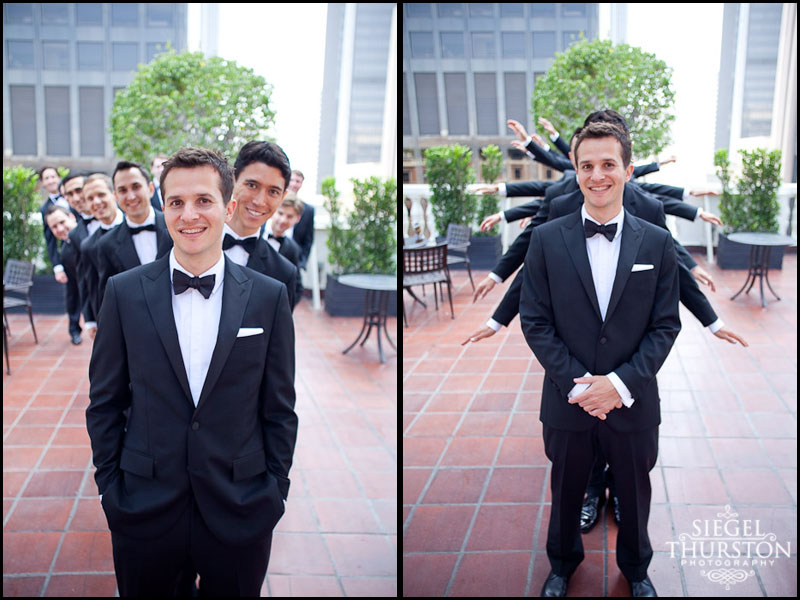 fun poses of the groom and his groomsmen